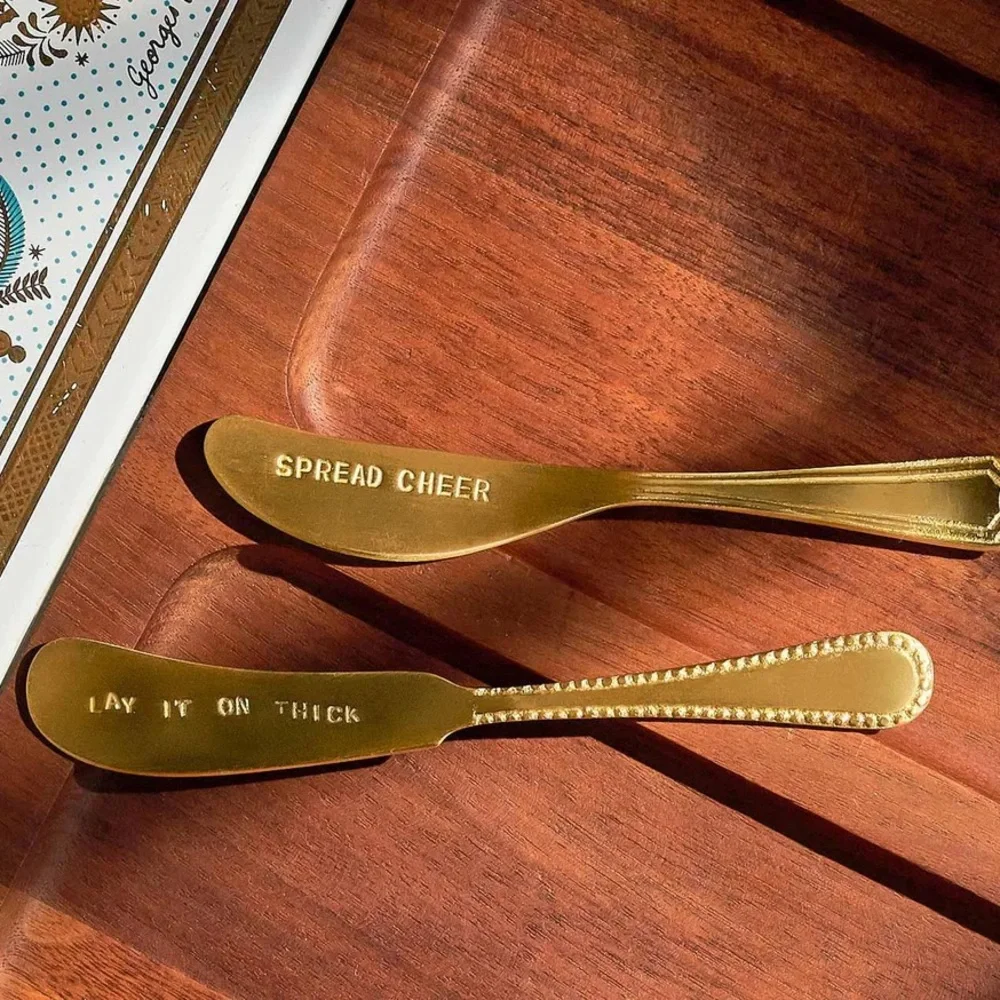 BRASS ENGRAVED CANAPE KNIVES